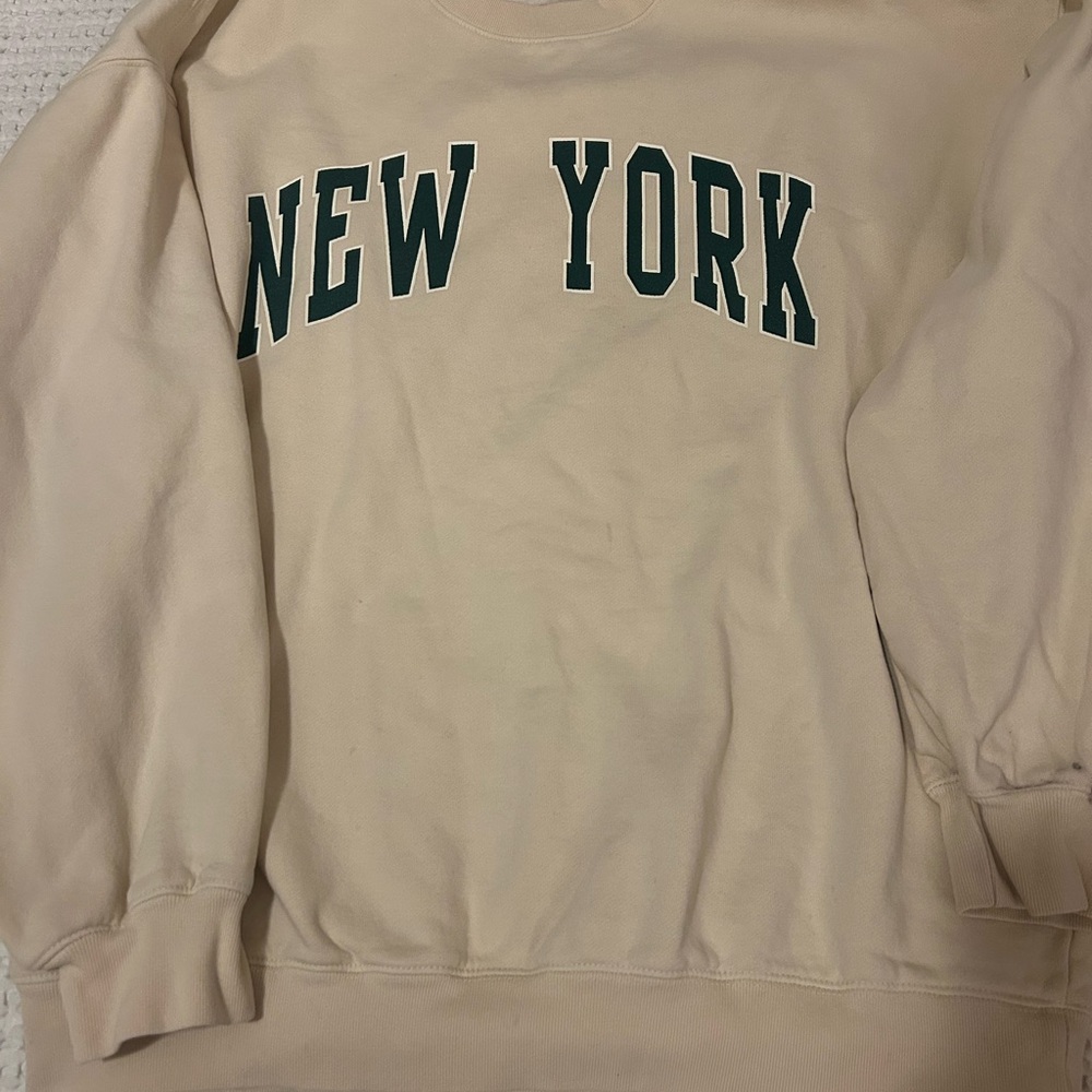Brandy Melville Cream 'New York' Crewneck Sweater